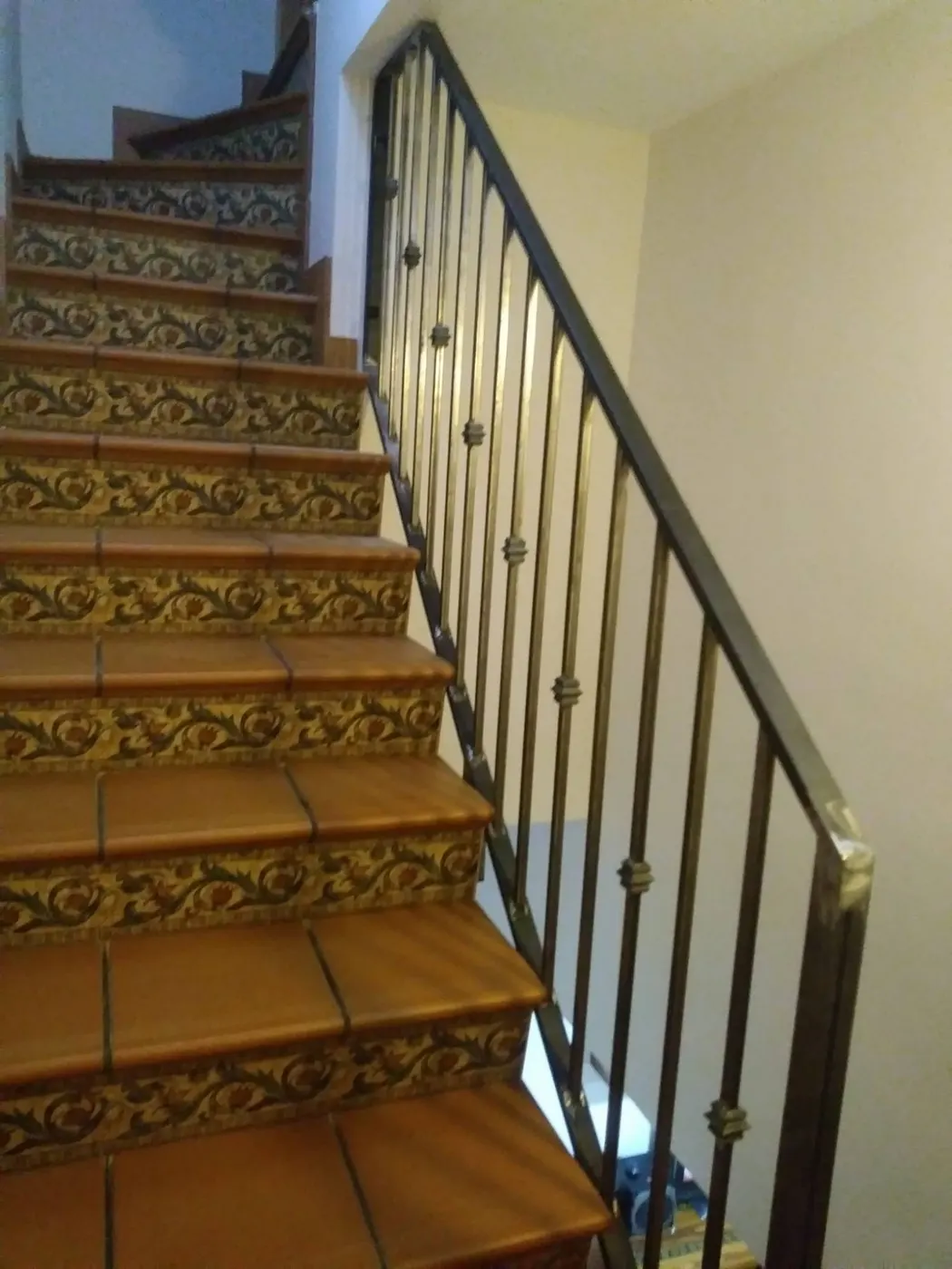 Barandilla de forja en escalera de vivienda